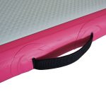 Close-up of Air Tumble Track Gymnastics Mat with pink edge and black carry handle for easy transport.