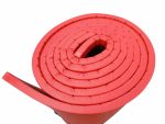 Rolled red gymnastics agility mat designed for safe training and exercise