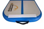 Side view of the AirTumble AirBoard, highlighting its handle for easy portability and the inflatable surface designed for various training activities.