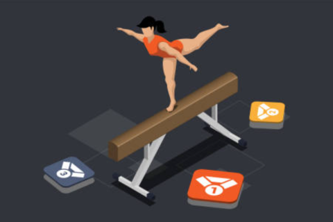 Athlete practicing balance skills on gymnastics beam