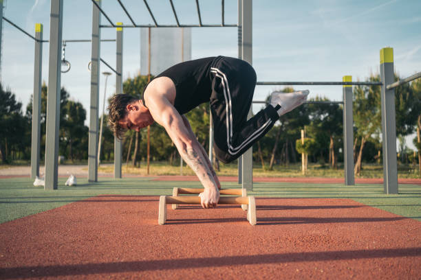 Airtumble adjustable gymnastics parallettes with height-adjustable bars for strength and balance training.